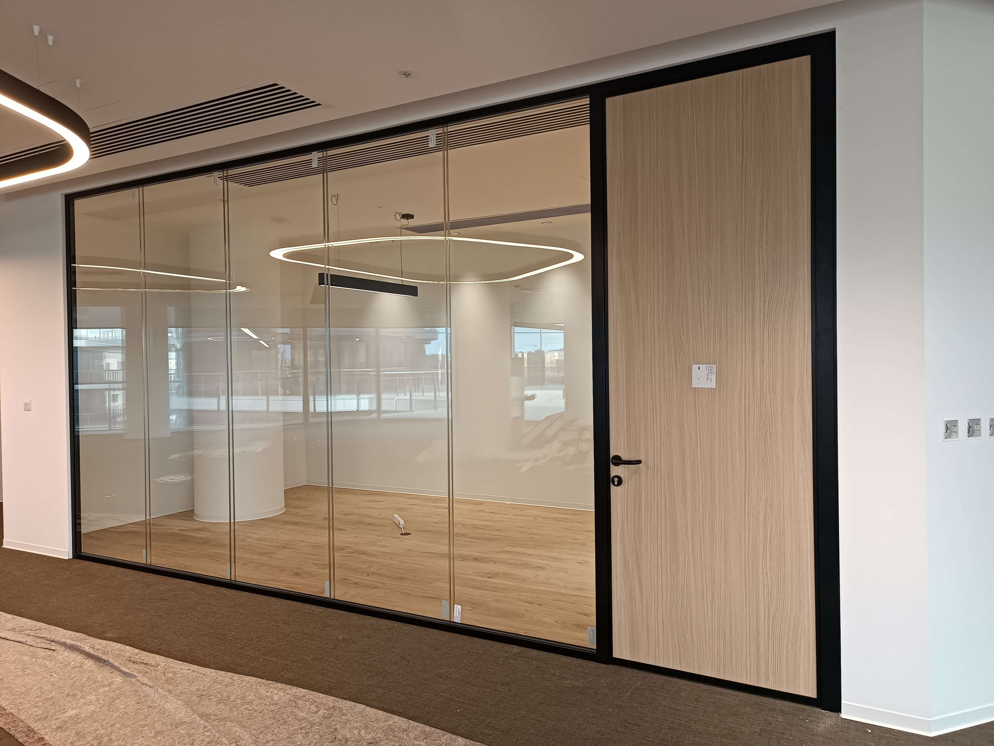 modern glass partition installation